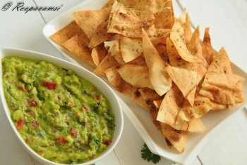  painting titled Guacamole dip with Pita bread chips