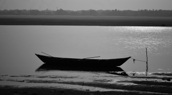  painting titled Solitary Boat on The Subarnarekha