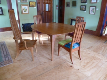 wood painting titled Marc Dining Set 