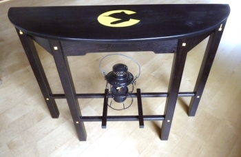 wood painting titled Conductor's Hat Table